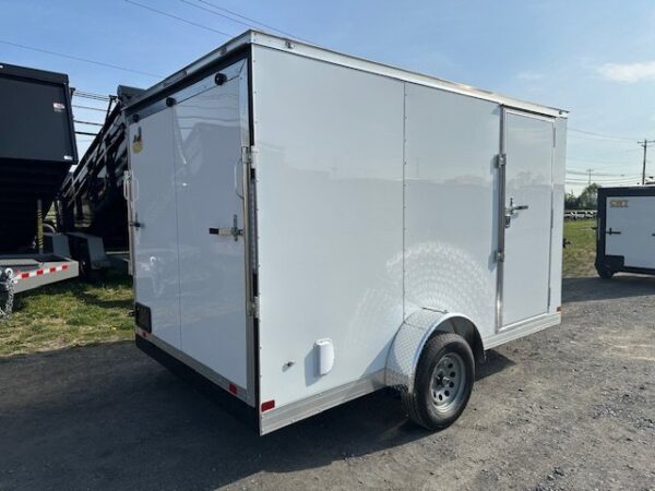 2025-COVERED-WAGON-7X12-ENCLOSED-CARGO-TRAILER-RAMP-DOOR-V-NOSE-4.jpg Covered Wagon 7’x12′ Enclosed Trailer — 6″ Added Height