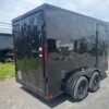 2025-HOMESTEADER-6X12-ENCLOSED-CARGO-TRAILER-BLACKOUT-TRIM-1.jpg Homesteader 6 x 12 V-Nose Enclosed Cargo Trailer – Black Trim