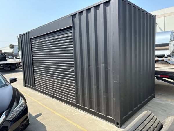 518319815_24084520591203501_6401163788766369853_n.jpg 20ft Used Shipping Container – Matte Black w/ 12’ Side Roll-Up Door