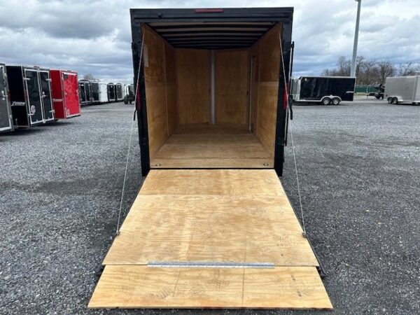 Homesteader-7-x-14-Enclosed-Cargo-Trailer-V-Nose-Ramp-Door-Added-Height-Blackout-Package-OHV-6.jpg Homesteader 7 x 14 Enclosed Cargo Trailer – Black Trim OHV