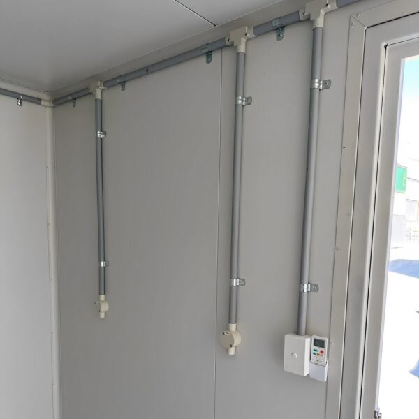 White-10′-container-modification-with-AC2.jpg White Modified 10ft Shipping Container with AC